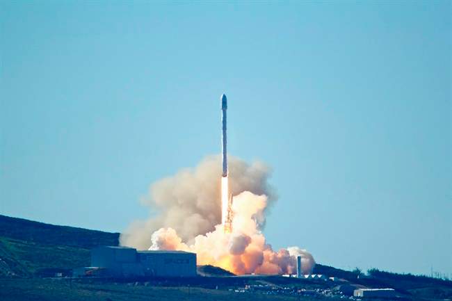 Space-X's Falcon 9 rocket with 10 satellites launches at Vandenberg Air Force Base, Calif. on Saturday, Jan. 14, 2017.