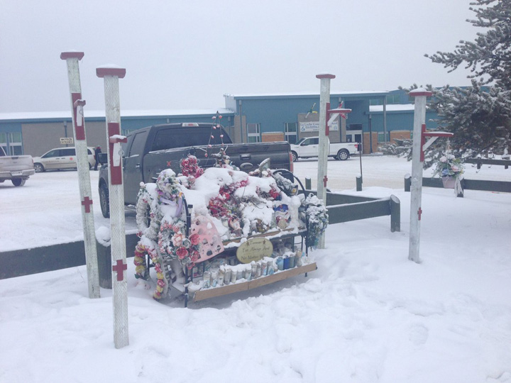 The principal in a remote northern Saskatchewan community where there was a deadly school shooting almost a year ago says staff and students feel like they've been abandoned.