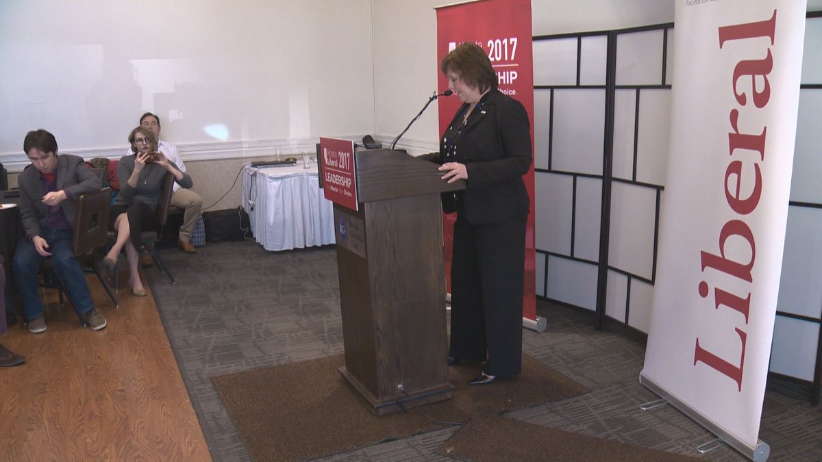 Alberta Liberal Party President, Karen Sevcik, addresses party members at a meeting in Edmonton.