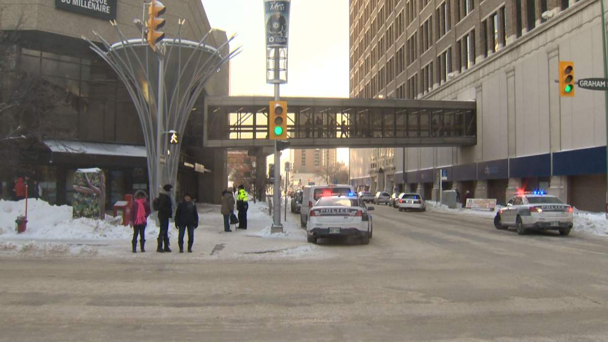 Police blocked off a portion of skywalk inside the Millenium Library after reports someone went over the balcony Thursday afternoon.