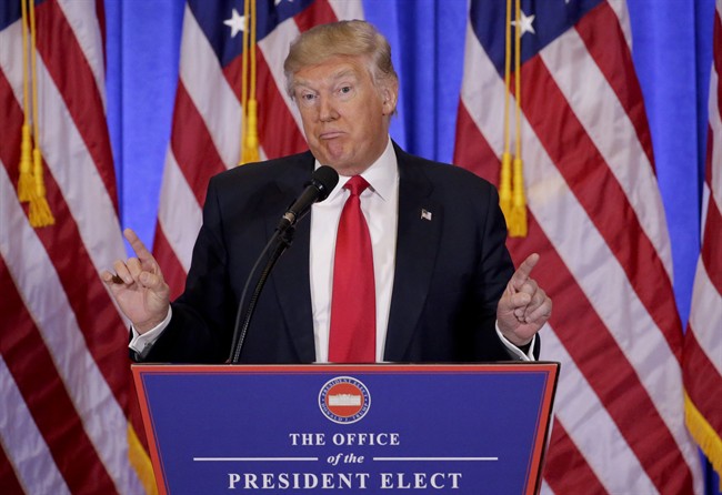 In this file photo dated Wednesday, Jan. 11, 2017, President-elect Donald Trump speaks during his first news conference as President-elect, in New York. 