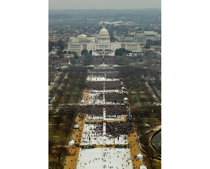 Attendees listen as Donald Trump speaks after being sworn in as the 45th president of the United States at the U.S. Capitol in Washington, January 20, 2017.