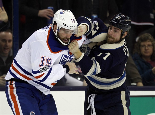 Columbus Blue Jackets forward Brandon Dubinsky, right, fights with Edmonton Oilers forward Patrick Maroon during the second period of an NHL hockey game in Columbus, Ohio, Tuesday, Jan. 3, 2017. 