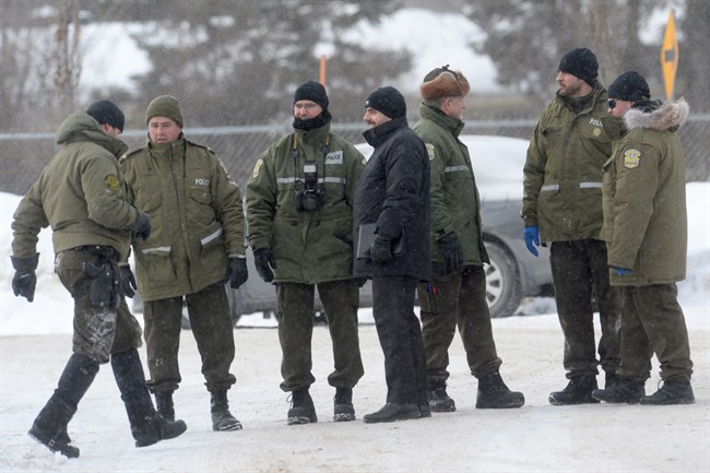 Police attend the scene near a Quebec City mosque on Monday, January 30, 2017. A mass shooting left six people dead and another 19 wounded at the mosque. 