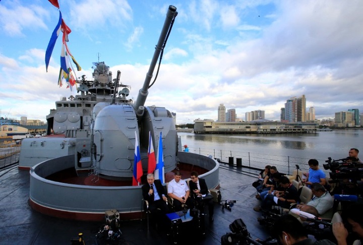 Russian Ambassador to the Philippines Igor Khovaev (L) and Rear Admiral Eduard Mikhailov (C), the deputy commander of Flotilla of Pacific Fleet of Russia, answer questions from the members of the media onboard the Russian Navy vessel, Admiral Tributs, a large anti-submarine ship, docked at the south harbor port area in metro Manila, Philippines January 4, 2017. REUTERS/Romeo Ranoco.