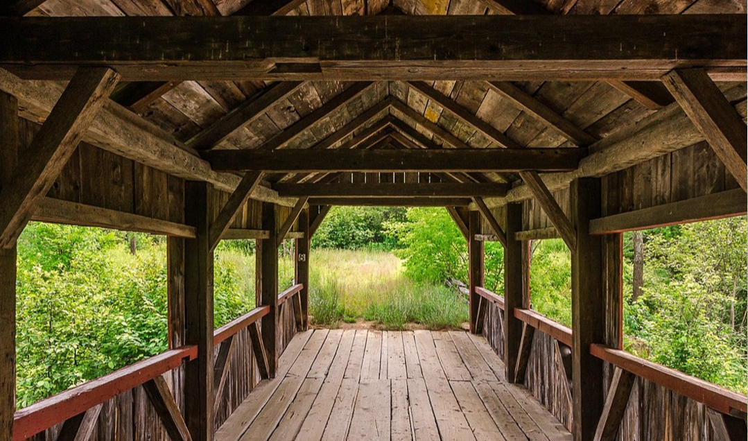 A covered bridge in a 19th century-style village in Rawdon, Que., which has been listed for $2.8 million.