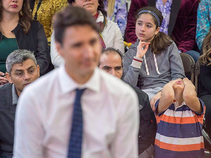 A young boy attends a town hall meeting with Prime Minister Justin Trudeau during a visit to the Cultural Centre in Fredericton on Tuesday, Jan. 17, 2017. 