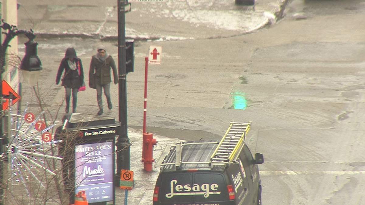 Commuters brave the freezing rain, Tuesday, Jan 24, 2017.