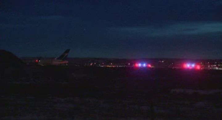 A WestJet flight was followed in by firefighters after reports of a flat tire Saturday night.