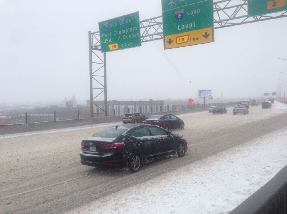 "Traffic moving slowly on Ville-Marie expresssway. Very slippery. Snow covered roads."