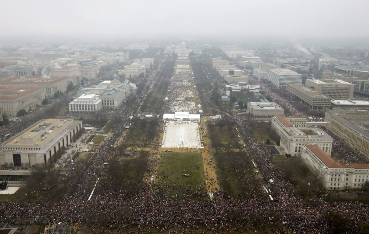 With the U.S. Capitol in the background, a crowd overflows onto the National Mall during the Women’s March on Washington during the first full day of Donald Trump’s presidency, Saturday, Jan. 21, 2017 in Washington, D.C.
