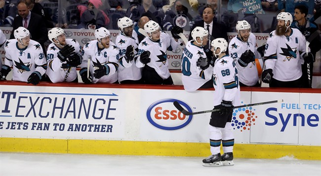 San Jose Sharks centre Melker Karlsson (68) celebrates with his bench after scoring on a penalty shot against the Winnipeg Jets during third period NHL hockey action in Winnipeg, Tuesday, January 24, 2017. 