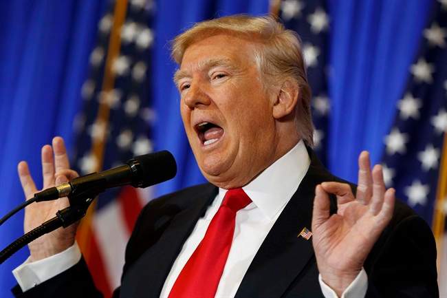 FILE - In this Jan. 11, 2017 file photo, President-elect Donald Trump speaks during a news conference in the lobby of Trump Tower. (AP Photo/Evan Vucci, File).