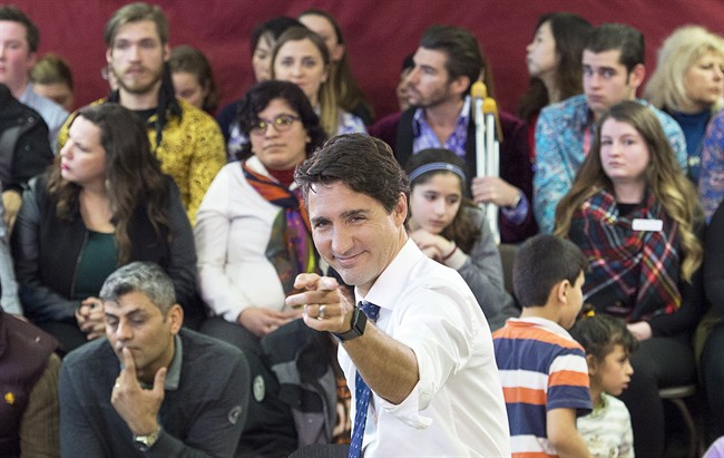 Prime Minister Justin Trudeau fields questions at a town hall meeting during a visit to the Cultural Centre in Fredericton on Jan. 17, 2017.