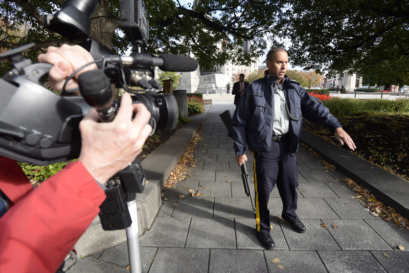 Police secure an area around Parliament Hill in Ottawa on Wednesday Oct.22, 2014. 
