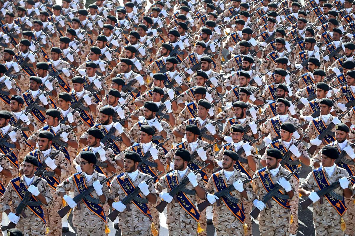 Iran’s Revolutionary Guard troops march in a military parade marking the 36th anniversary of Iraq’s 1980 invasion of Iran, in front of the shrine of late revolutionary founder Ayatollah Khomeini, just outside Tehran, Iran, on Wednesday, Sept. 21, 2016.