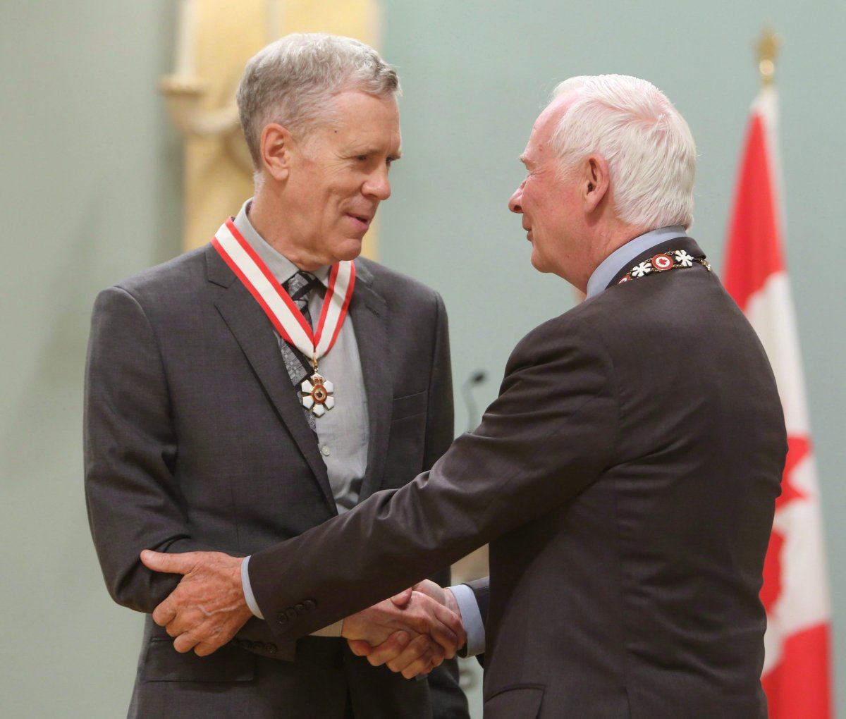 Author and humourist Stuart McLean is presented with the Officer of the Order of Canada medal by Governor General David Johnston in Ottawa on Friday, September 28, 2012. The Vinyl Cafe" writer and host Stuart McLean is suspending his popular radio show to focus on his cancer treatment.