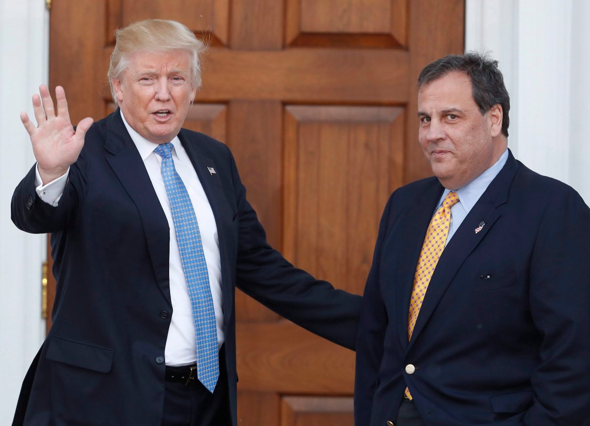In this Nov. 20, 2016 file photo, President-elect Donald Trump, left, waves to the media as New Jersey Gov. Chris Christie arrives at the Trump National Golf Club Bedminster clubhouse,  in Bedminster, N.J. 