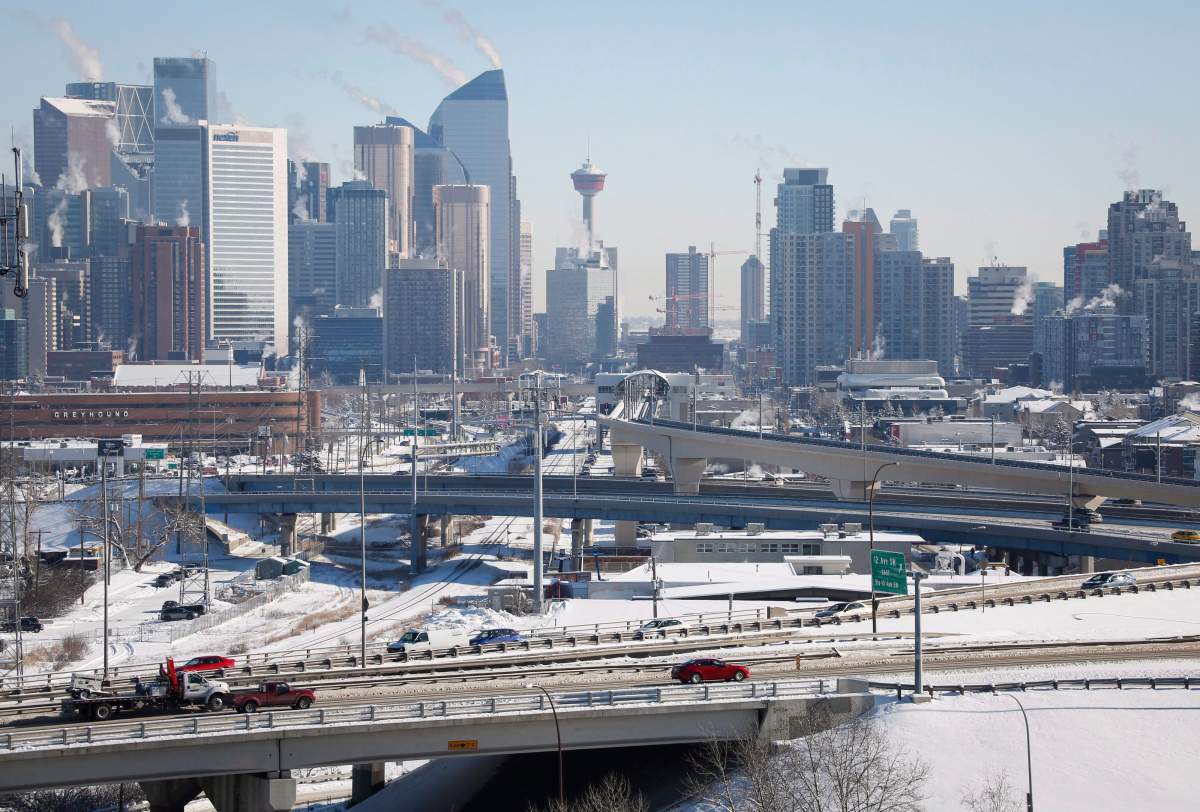 Highway traffic moves through Calgary, Alta., Wednesday, Feb. 8, 2017. New census data shows the population of the metropolitan area of Calgary outpaced the national growth rate over the last five years. THE CANADIAN PRESS/Jeff McIntosh.