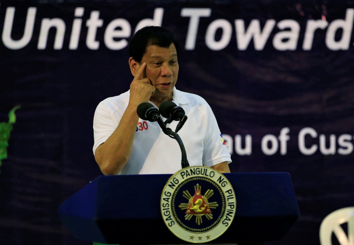 Philippine President Rodrigo Duterte gestures while delivering a speech during the 115th founding  anniversary of the Bureau of Customs in metro Manila, Phillippines February 8, 2017. 
