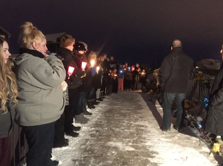 A candlelight vigil was held Friday, Feb. 24, 2017 for a young boy who died after falling through the ice in Airdrie. 