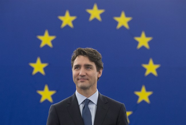 Canadian Prime Minister Justin Trudeau stands as he is introduced before addressing the European Parliament in Strasbourg, France, Thursday, February 16, 2017. 