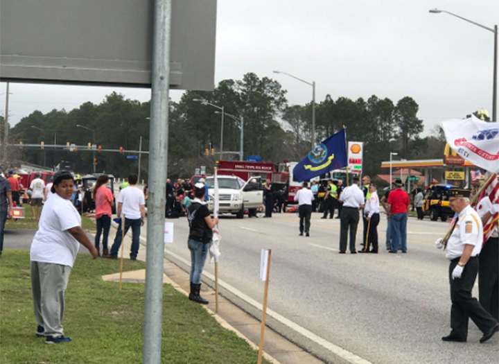 At least 11 people were injured, three of them critically, after a car plowed into a Mardi Gras parade in Gulf Shores, Alabama Tuesday morning.