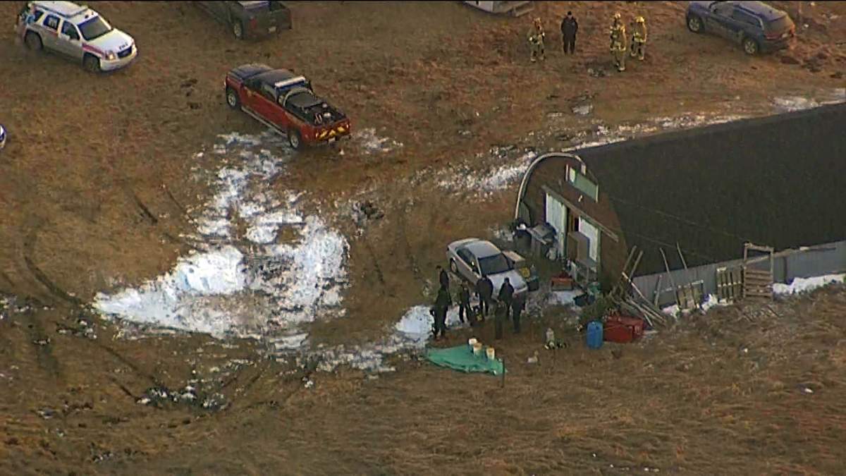 Aerial footage captured by the Global 1 helicopter showes a number of RCMP officers on a section of land in the rural community of Bearspaw on Thursday, Feb. 23, 2017. 