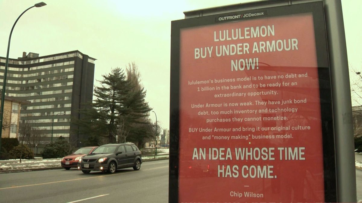 A new bus stop ad outside Lululemon's Vancouver headquarters has Chip Wilson urging the company to buy Under Armour.