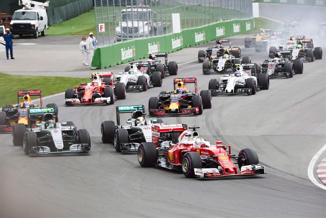 Grand Prix kicks off with topless protester, ribbon-cutting - Montreal ...