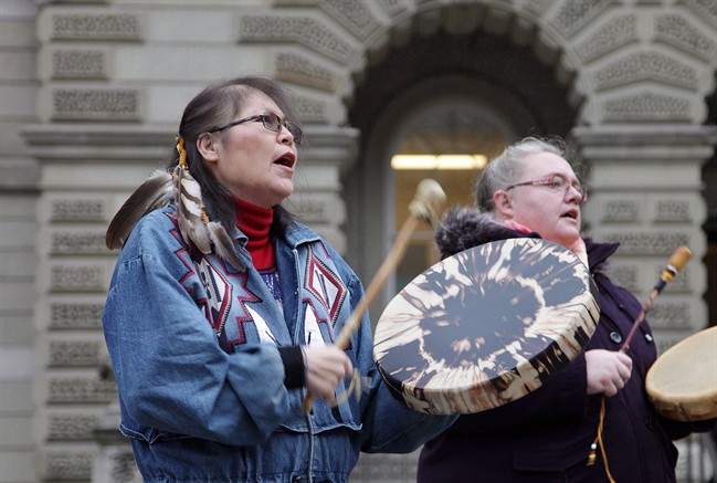 Marcia Brown Martel (left) is seen outside court in Toronto on Thursday, Dec. 1, 2016.