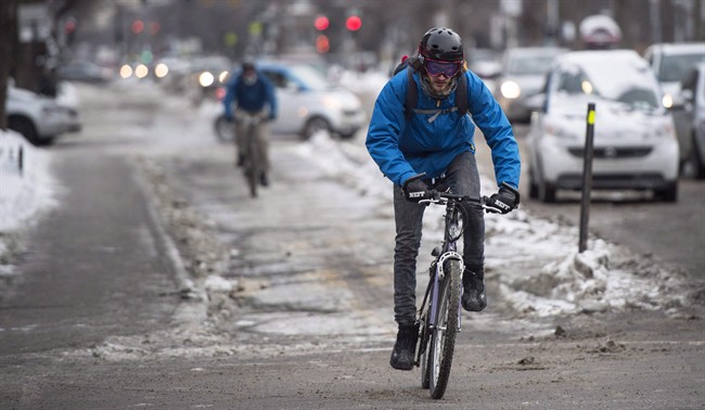 A cyclist makes his way down a bike path in Montreal.