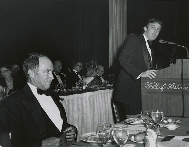Pierre Trudeau listens to Donald J. Trump on November 5, 1981 in this Library and Archives of Canada photo in New York. Canada\’s diplomatic gifts to President Trump included a picture of himself, standing next to Pierre Trudeau, when they spoke at the same event in 1981. Trump said of the gift: \”(Justin\’s) father I knew, and respected greatly.\”