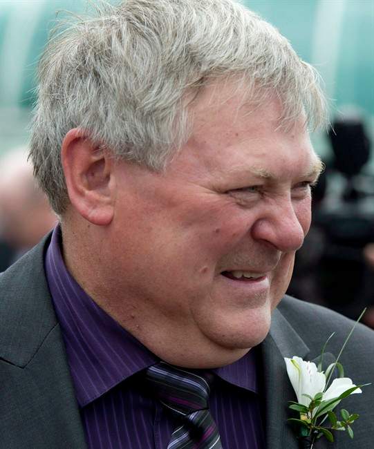 An assault charge against Pat Pimm, a member of the B.C. legislature, has been stayed, the province's Criminal Justice Branch said Monday. Pimm is seen during a ceremony announcing the B.C. Liberals new cabinet in Vancouver in a June 7, 2013, file photo.