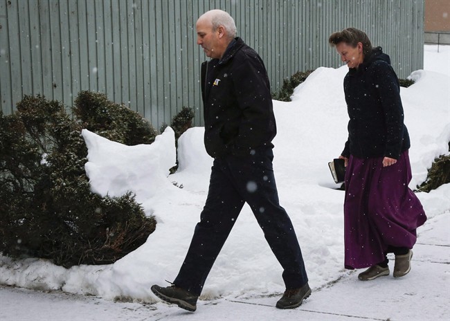 Gail Blackmore, right, and James Oler arrive at the courthouse in Cranbrook, B.C., on Feb. 3, 2017. A special prosecutor will ask British Columbia's Court of Appeal to overturn the acquittal of a former leader of a polygamous community who was found not guilty of taking a girl across the border for sexual purposes. The province's Criminal Justice Branch says prosecutor Peter Wilson has filed an appeal asking that James Oler either be convicted or that a new trial be held.