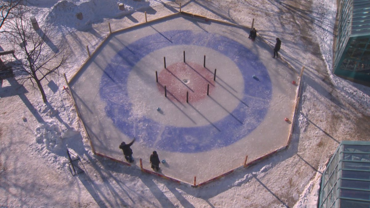 The activity is a hybrid sport that combines curling and the table top game crokinole.