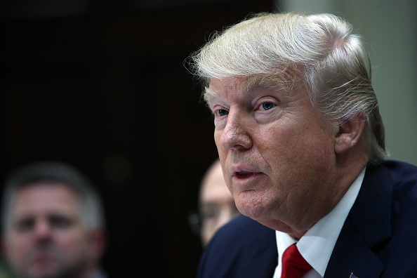 WASHINGTON, DC - FEBRUARY 02:  (AFP OUT) U.S. President Donald Trump meets with executives and union representatives from the Harley Davidson company at the White House on February 2, 2017 in Washington, DC. At the end of the photo opportunity, Trump said "nothing is off the table" in relation to current disagreements between the U.S. and Iran. (Photo by Win McNamee/Getty Images).