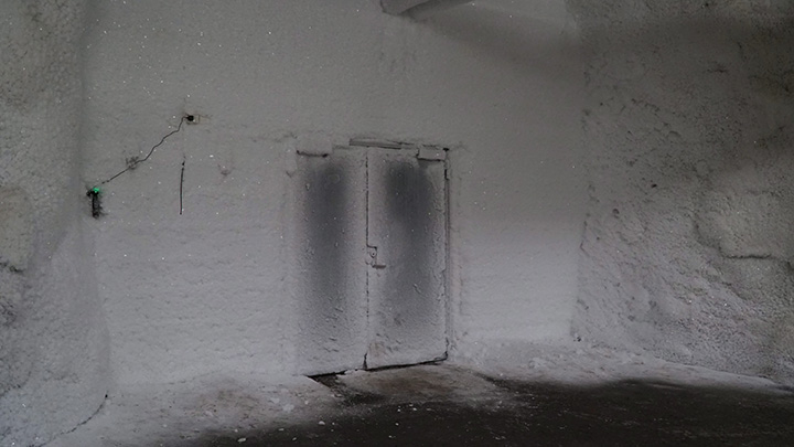 In this photo taken Sunday, Oct. 18, 2015, shows the door to the Global Seed Vault, keeping the temperature inside the vault at -18C, in Svalbard, Norway.