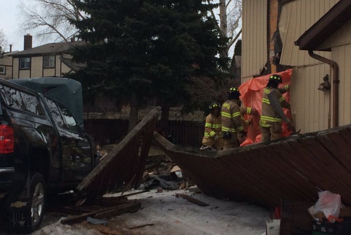 Emergency crews respond after a pickup truck appeared to have crashed into a house in southeast Edmonton on Feb. 20, 2017.