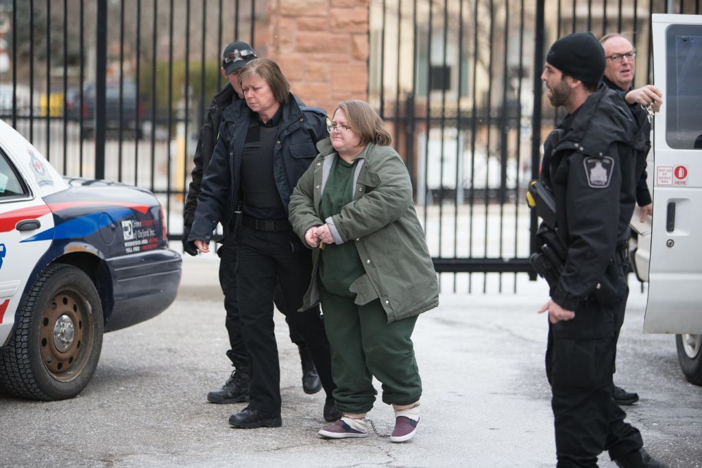 Elizabeth Wettlaufer is escorted into the Woodstock courthouse, January 13, 2017.
