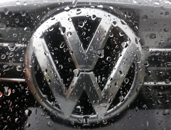 In this Nov. 18, 2016 file photo, the Volkswagen logo is photographed through rain drops on a window in Frankfurt, Germany. 
