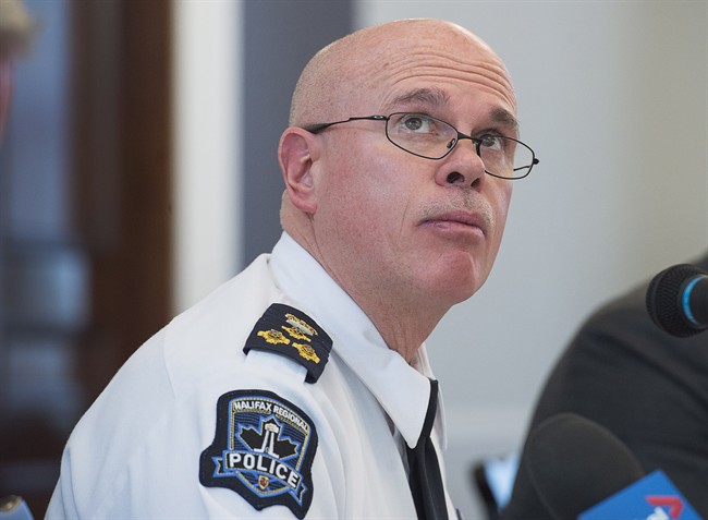 Chief Jean Michel Blais of the Halifax Regional Police views an overhead projection as he attends a meeting of the Board of Police Commissioners in Halifax on Monday, Feb. 27, 2017.