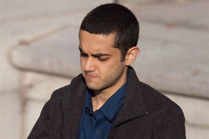 Hamed Shafia is led into court in Kingston, Ontario on Tuesday October 11, 2011.