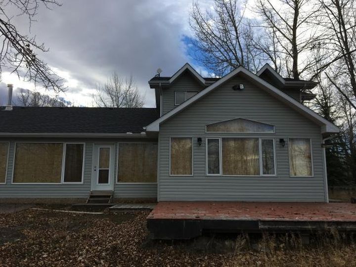 The government of Alberta is auctioning off this 2,293 square-foot property in the MD of Foothills, near High River, Alta.