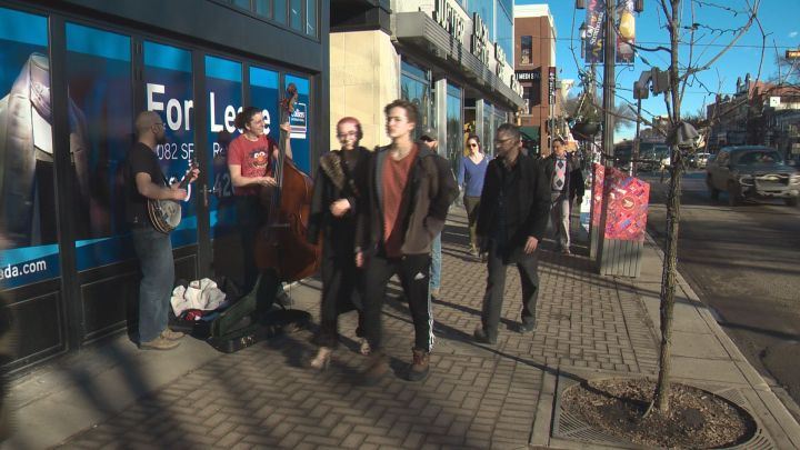 People out enjoying the unseasonably warm February weather in Edmonton.