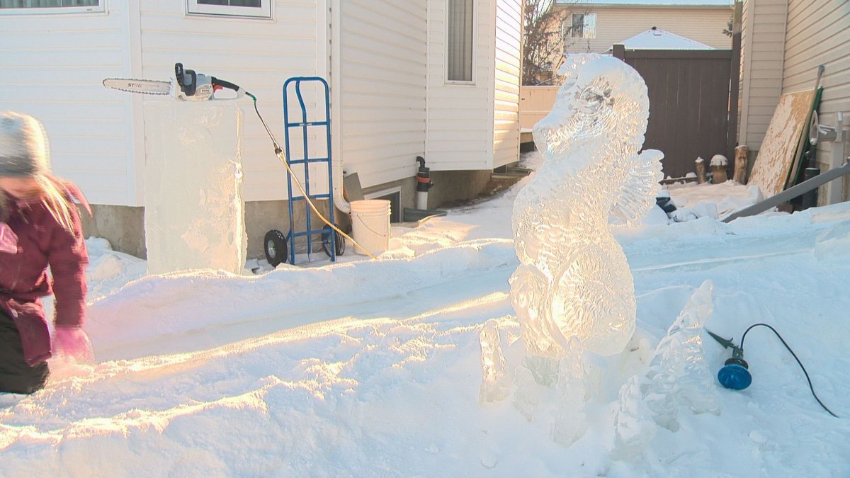 Ice carver uses leftovers to build massive slide in front yard ...