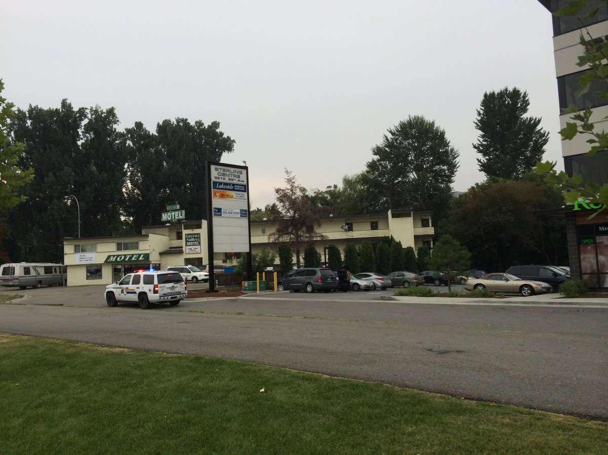 Police outside the Green Valley Motel on the day of the shootout in Polson Park. 