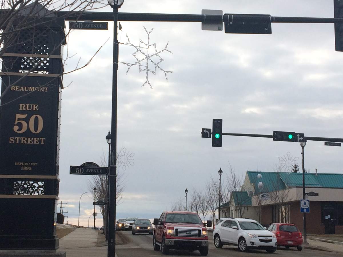 Cars go by in downtown Beaumont, Alta.