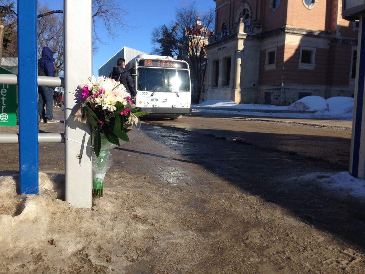 Flowers left at the scene where Irvine Fraser was stabbed Tuesday morning.