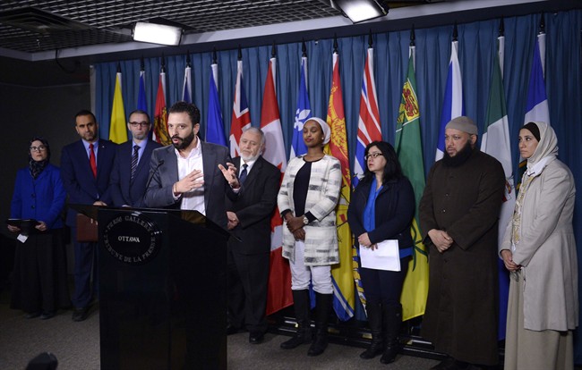 Haroon Bouazzi of AMAL-Quebec, a Quebec human rights group, speaks as leaders of national and Quebec organizations joined the National Council of Canadian Muslims to call on governments to counter Islamophobia, racism and discrimination, on Parliament Hill on Wednesday, Feb. 8, 2017 in Ottawa.